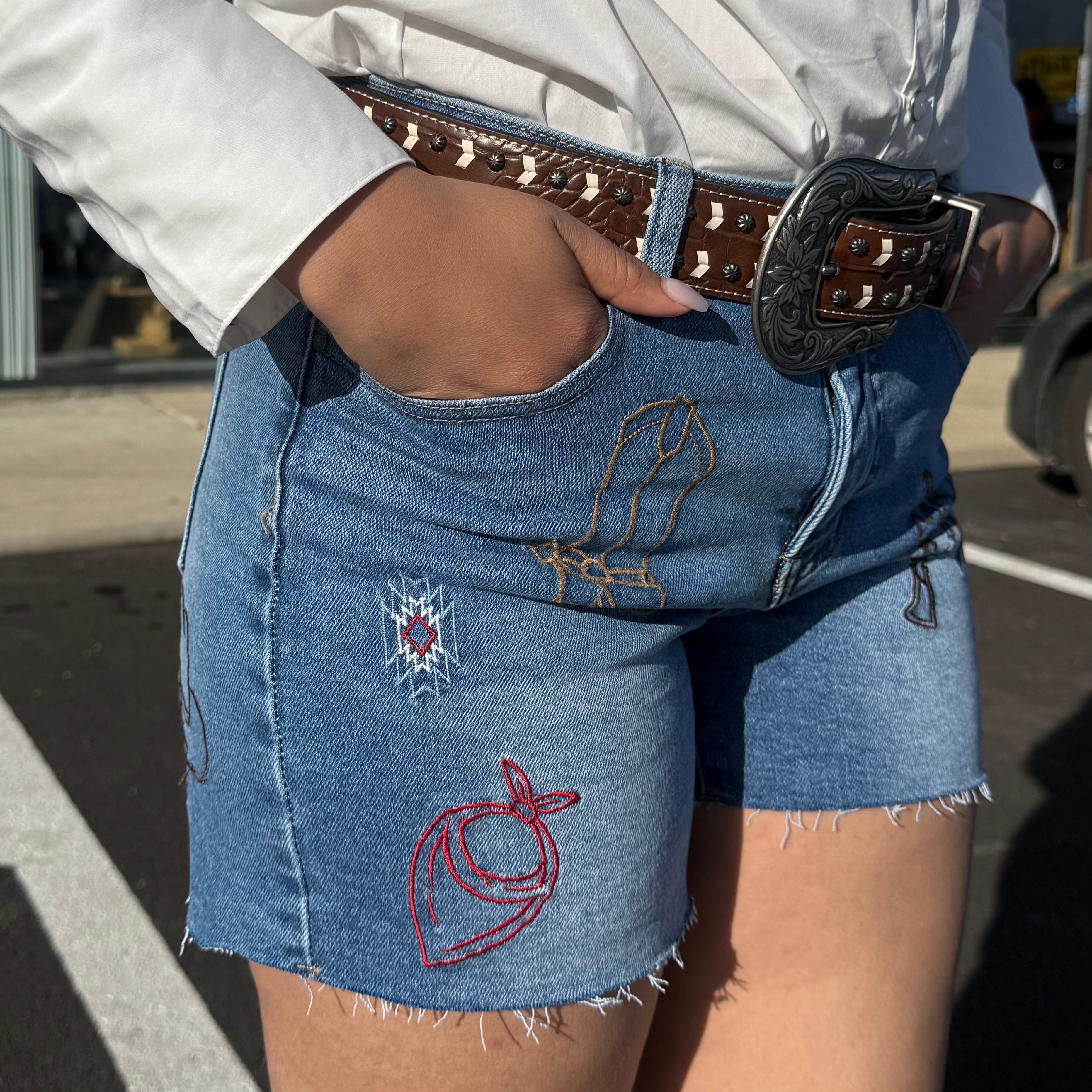 Pantalones cortos de piel sintética con flecos para mujer