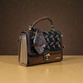 BROWN PRINTED TOP HANDLE HANDBAG